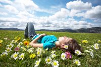 Woman SleepingIn Field