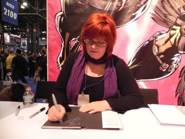 Gail Simone signs at the 2010 NYCC.